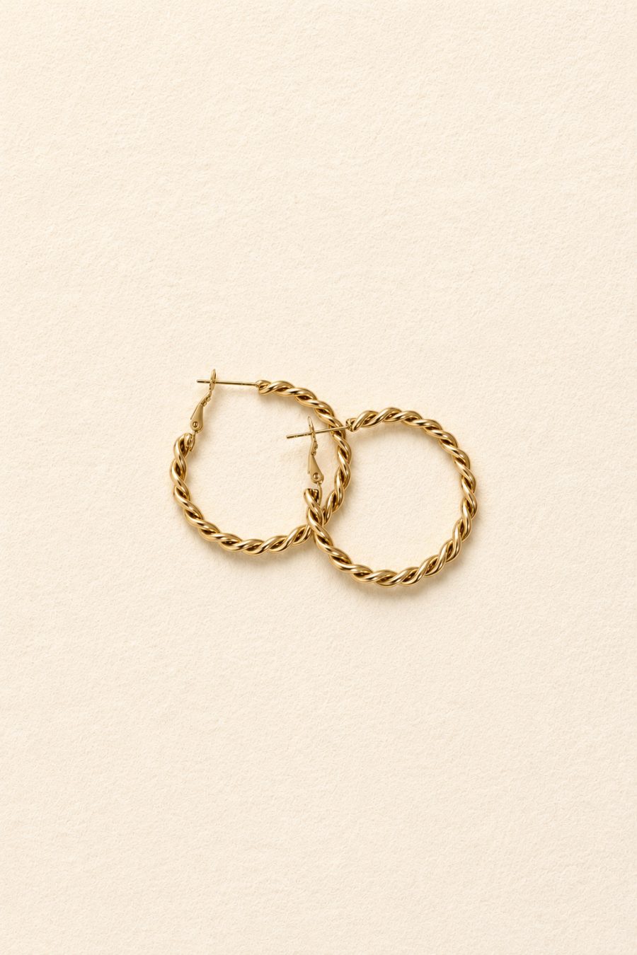 Boucles d'oreilles créoles dorées - effet torsadé