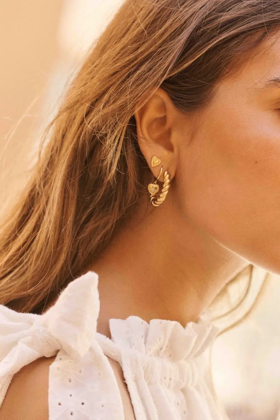 Boucles d'oreilles créoles dorées - effet torsadé