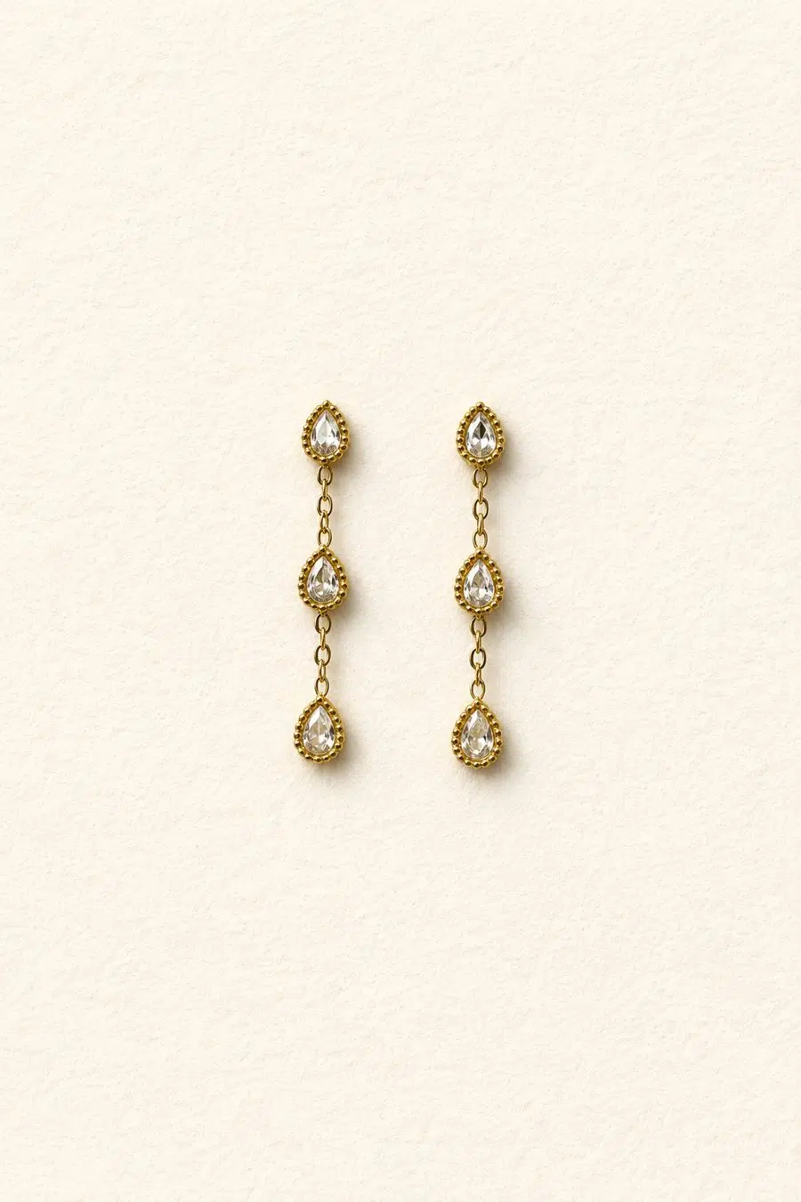 Boucles d’oreilles femme pendante dorée et strass