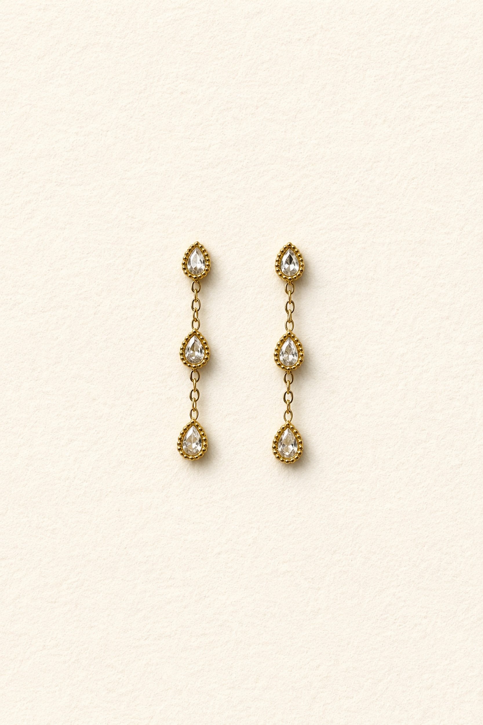Boucles d’oreilles femme pendante dorée et strass